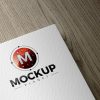 Free-Texture-Card-Logo-Mockup-PSD-With-Wooden-Background-2018