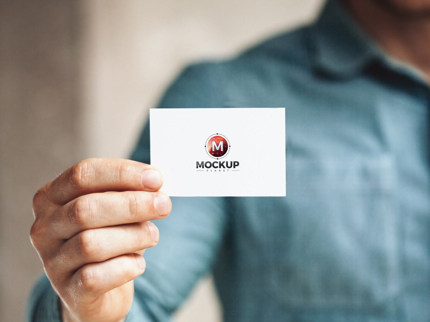 Free-Man-Holding-in-Hand-Business-Card-Mockup-PSD-For-Presentation