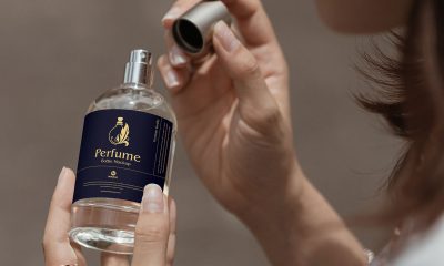 Free-Woman-Opening-Perfume-Bottle-Mockup-Design