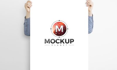 Free-Man-Holding-Branding-Poster-Mockup-For-Advertisement-2018