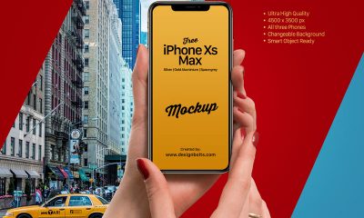 Free-Girl-Holding-Apple-iPhone-Xs-Max-Mockup-PSD-2018