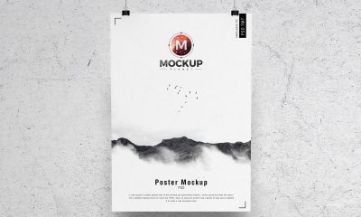 Free-Concrete-Wall-Hanging-Brand-Poster-Mockup-PSD