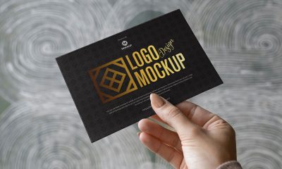 Free-Girl-Showing-Card-Logo-Mockup-Design